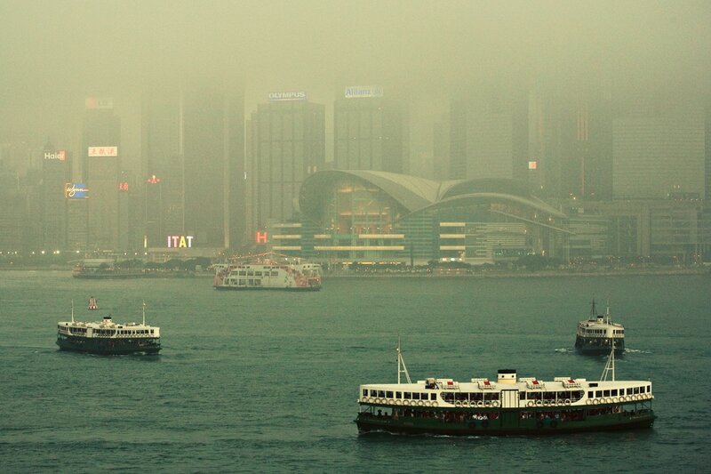 Ferries in hazy Hong Kong harbor