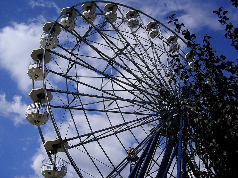 Ferris wheel against blue sky
