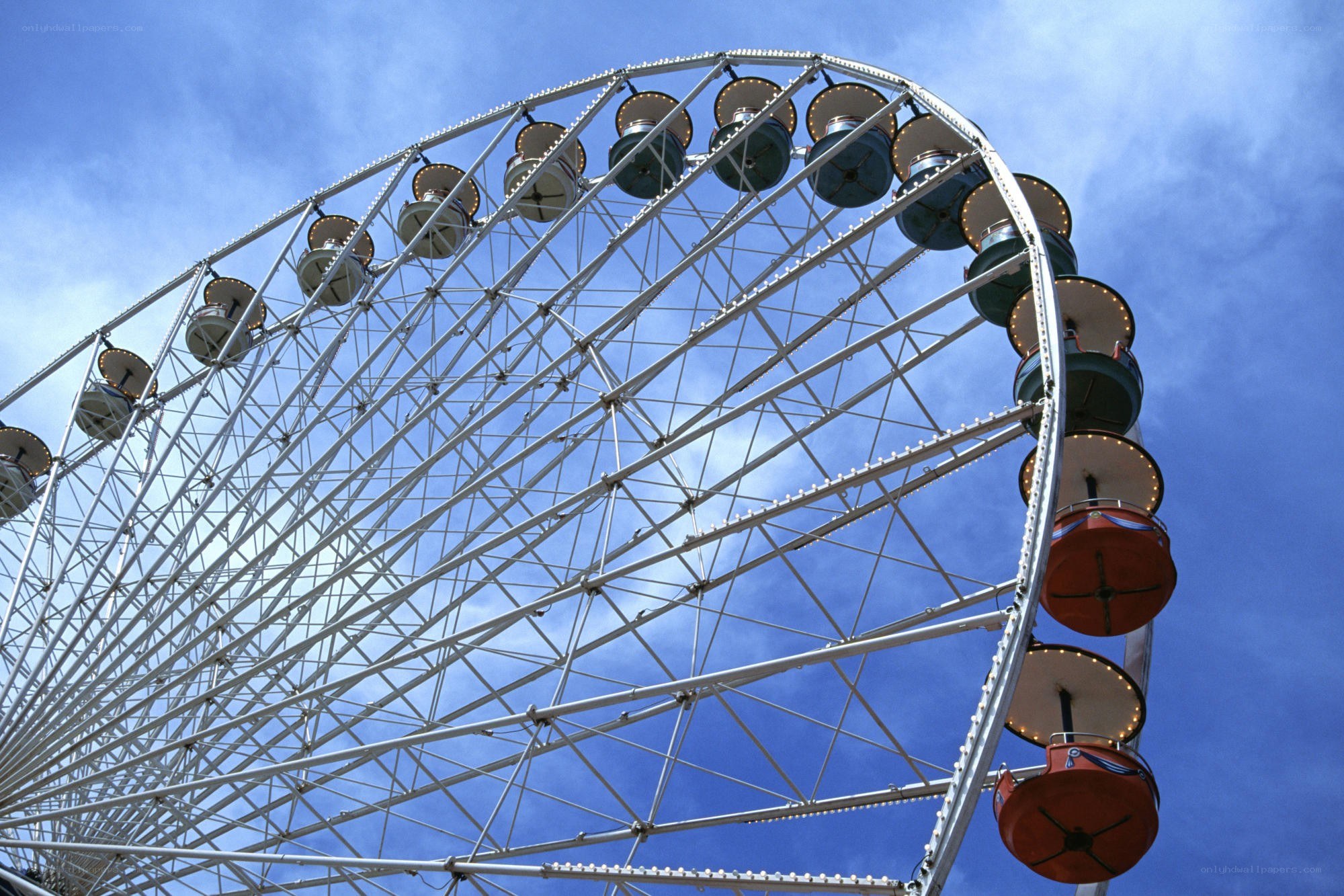 Ferris wheel against blue sky