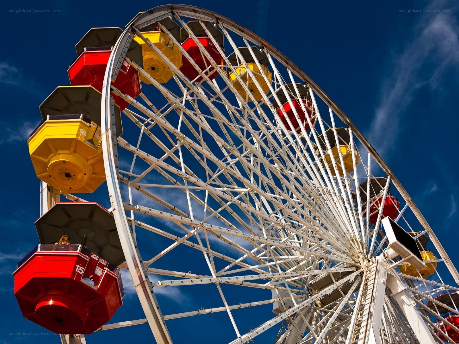 Ferris wheel against blue sky