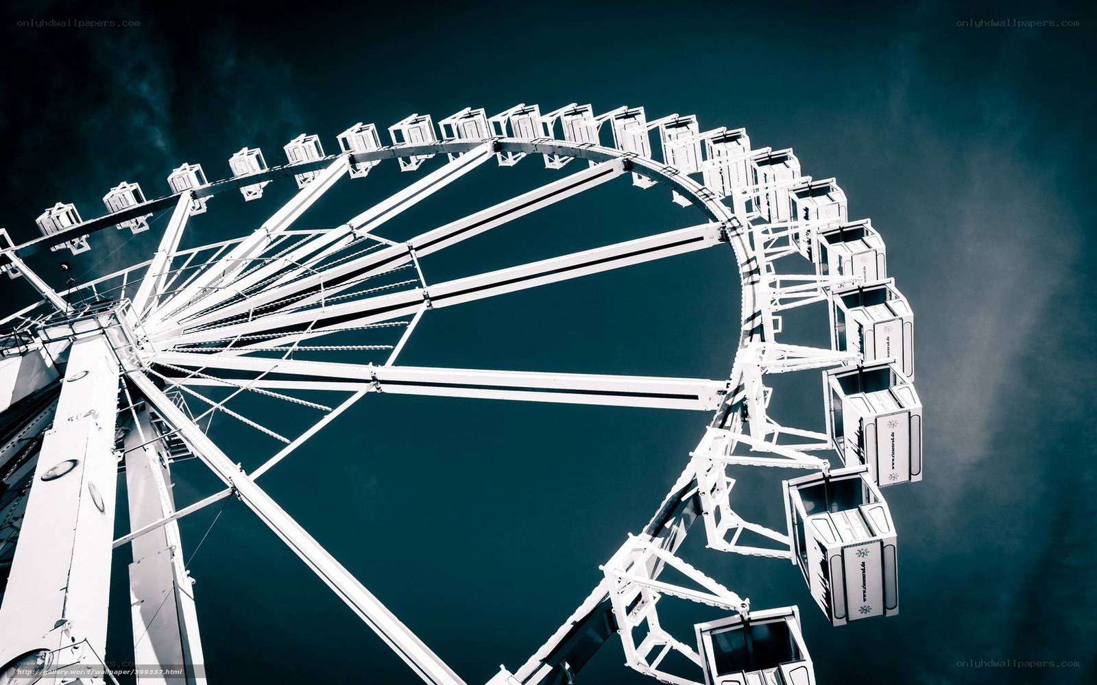 Ferris wheel against dark sky