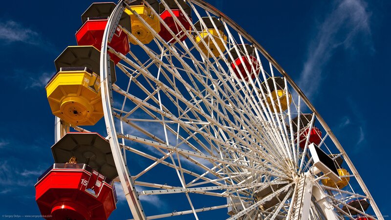 Ferris Wheel Against Sky — Blue, Dramatic
