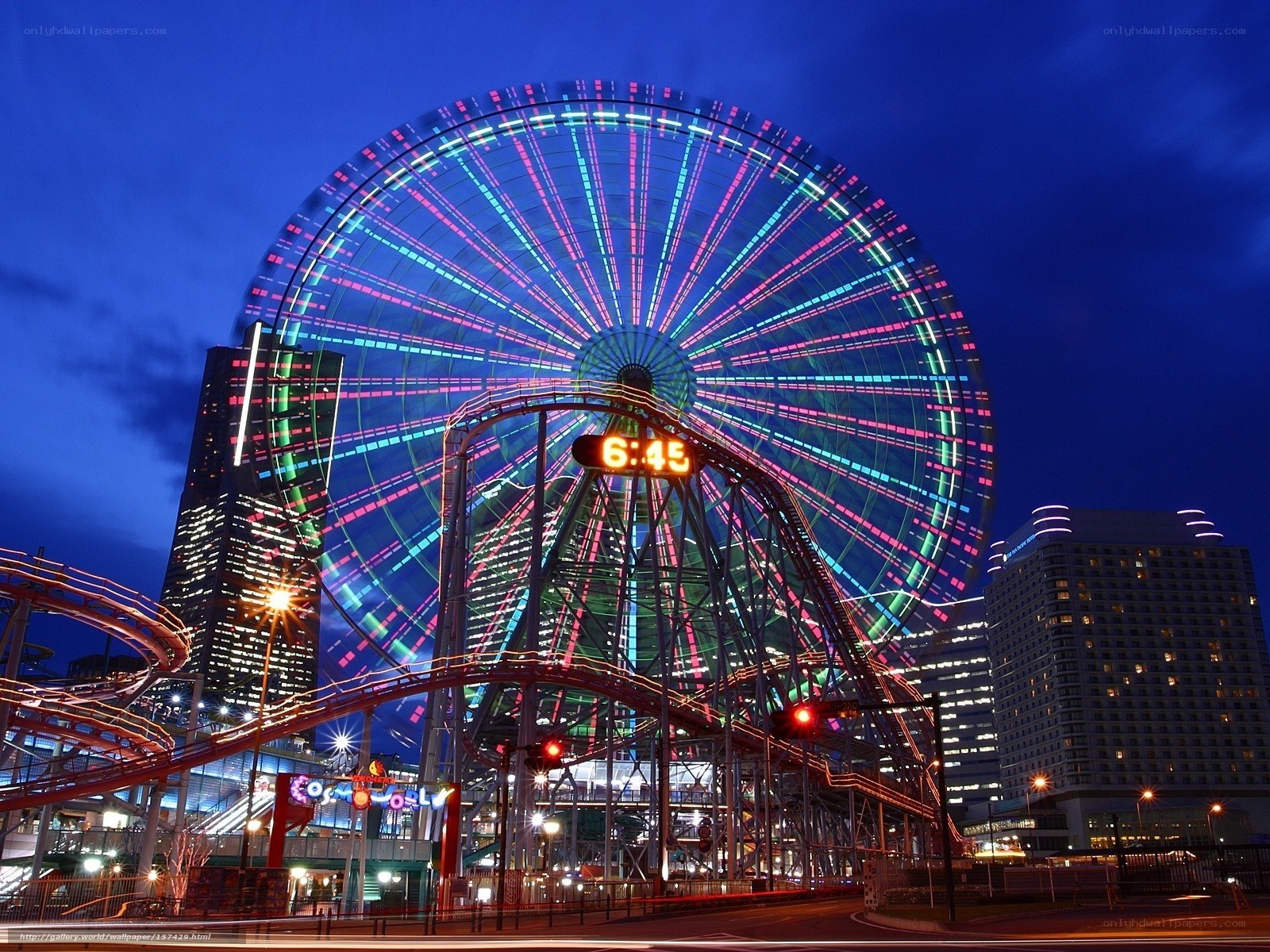 Ferris wheel at night in city