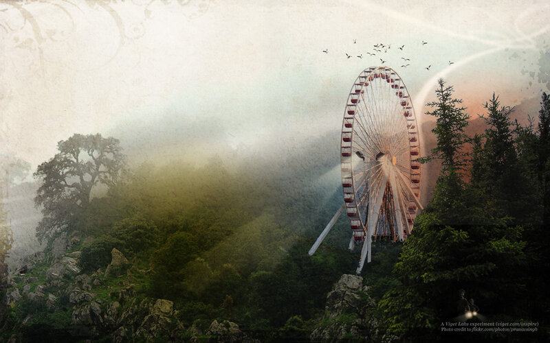 Ferris wheel in misty forest
