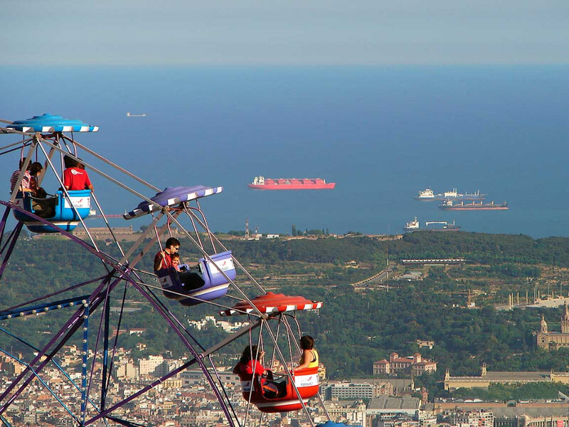 Ferris wheel with city view