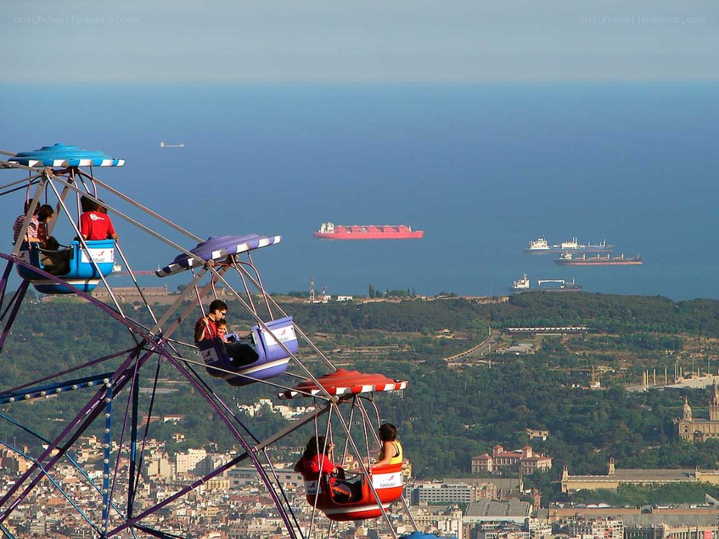 Ferris wheel with city view