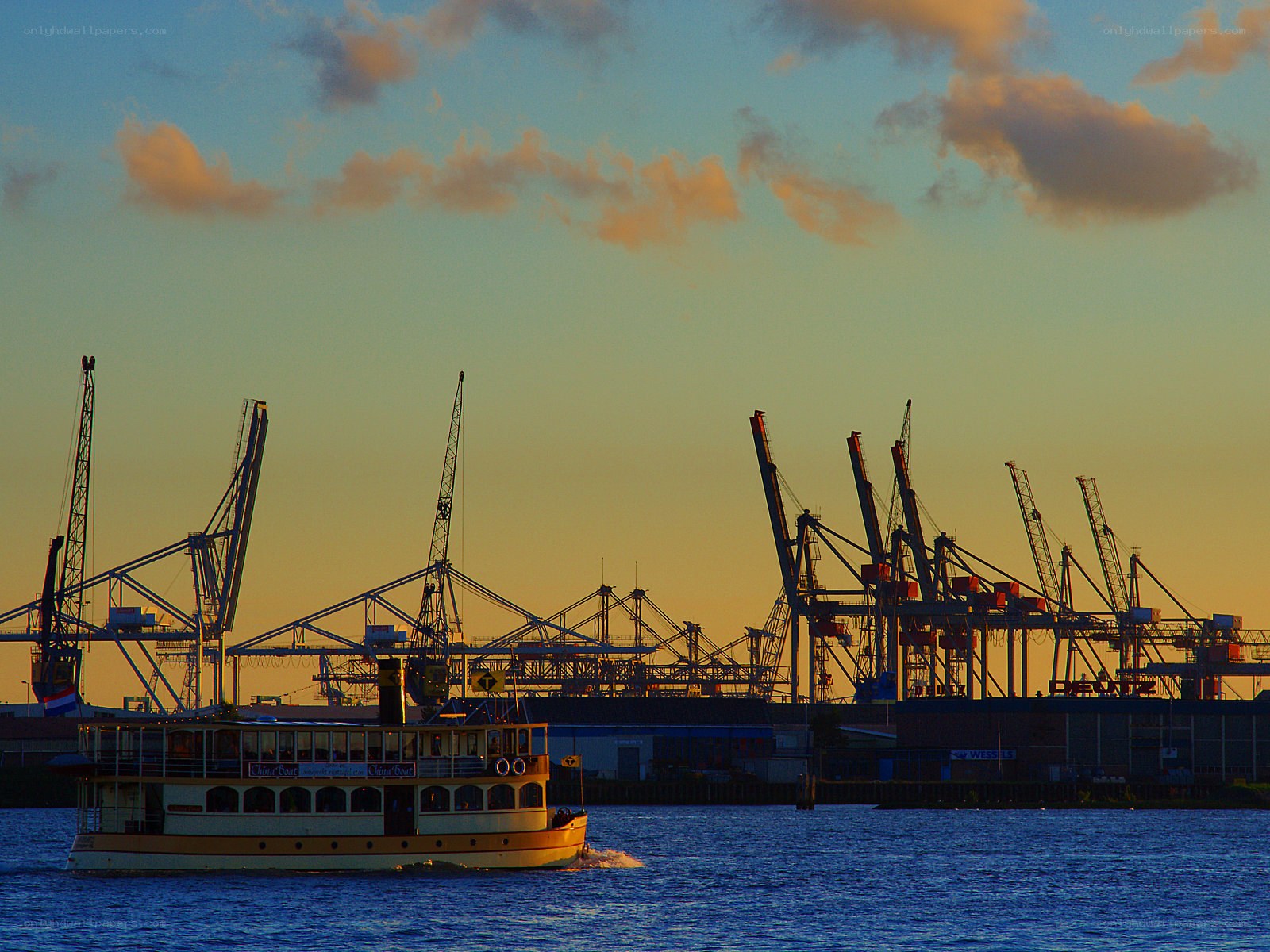Ferry at a port during sunset
