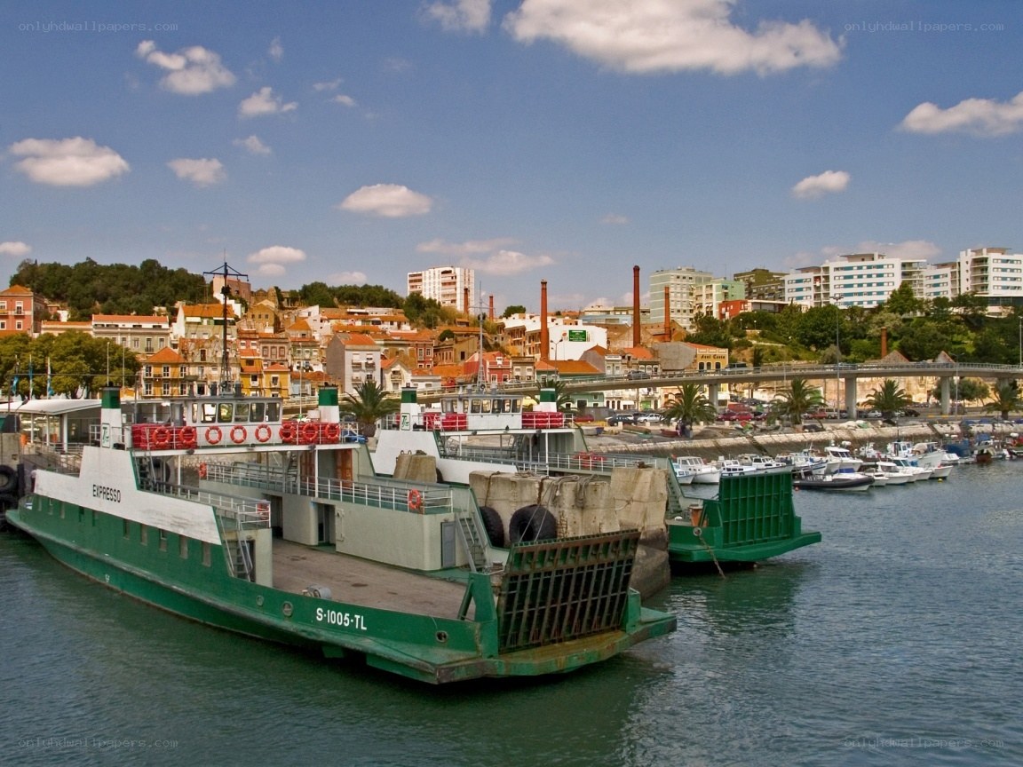 Ferry at port with city view
