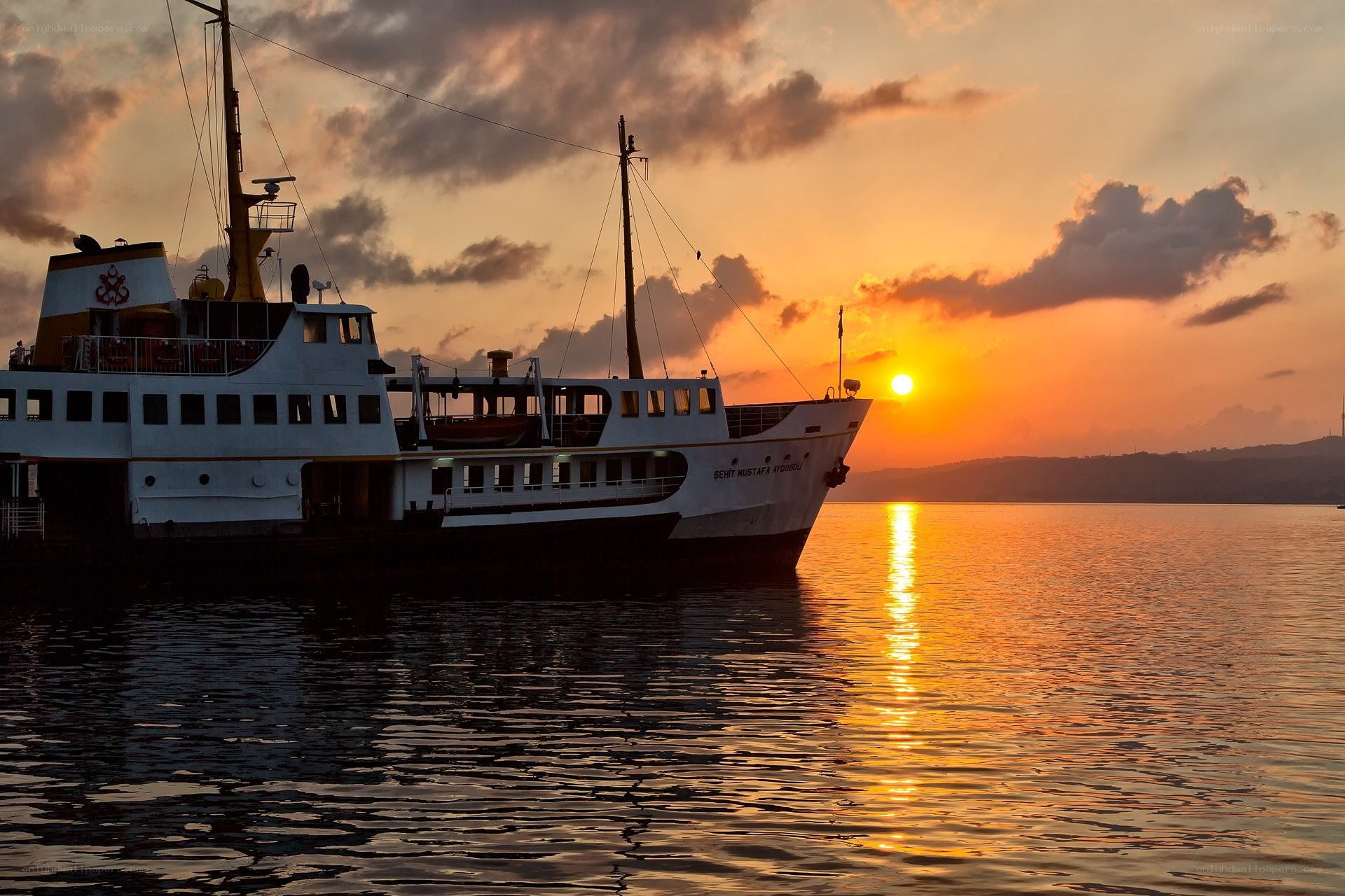 Ferry at sunset on the water