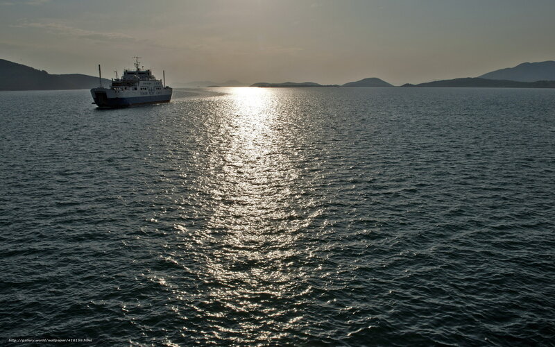 Ferry at sunset on the water