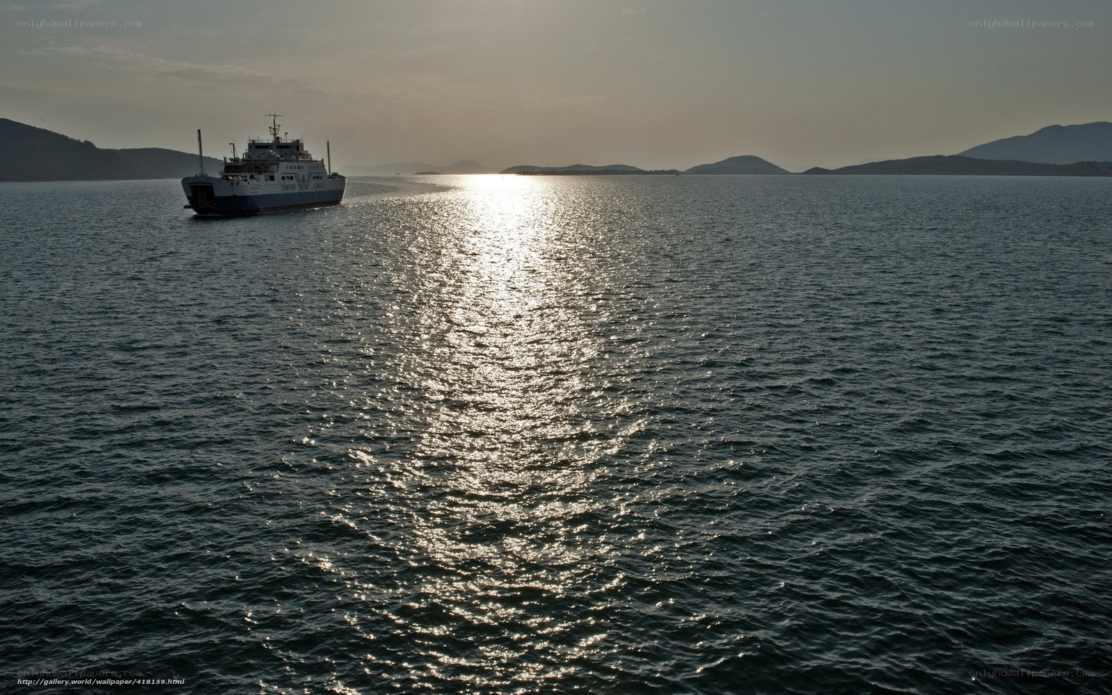 Ferry at sunset on the water