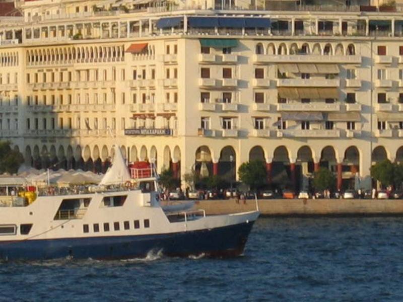 Ferry boat near a city waterfront