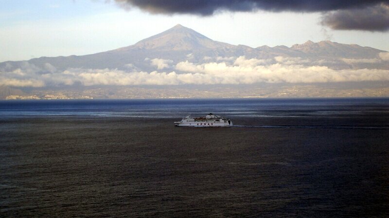 Ferry boat near mountain island
