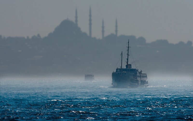 Ferry Boat on Water — Blue, Hazy