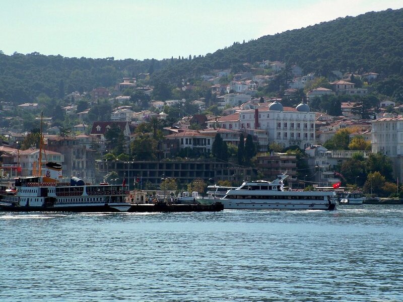 Ferry boats on a coastal city