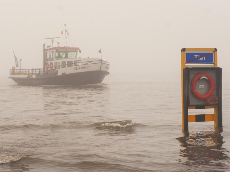 Ferry in Foggy Water