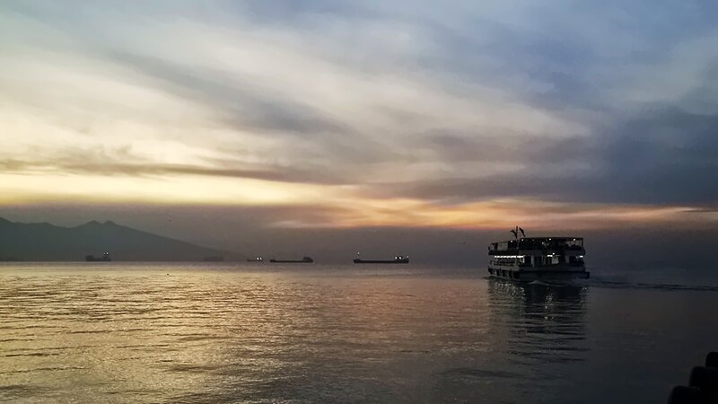 Ferry on Water at Dusk