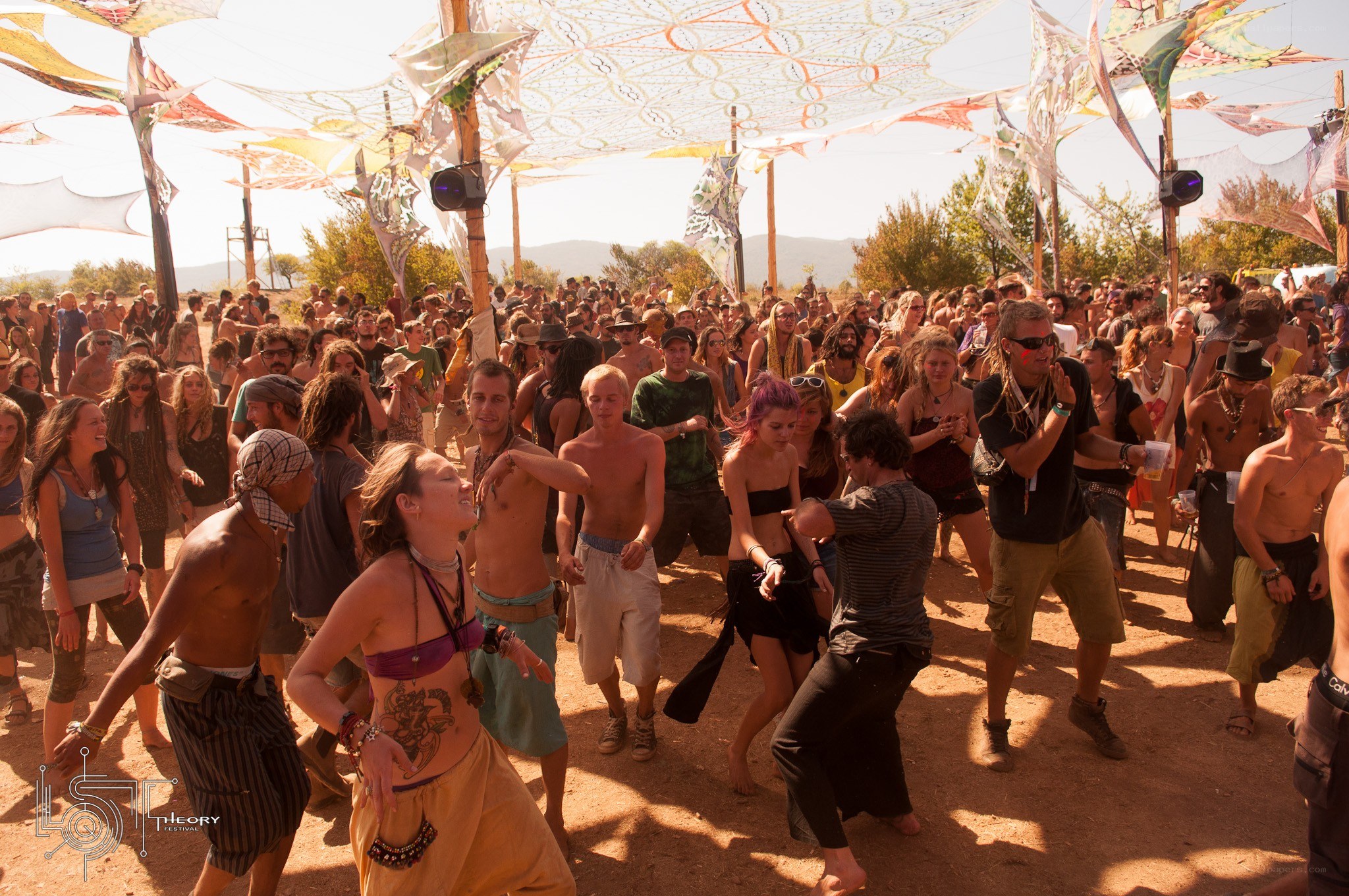 Festival crowd dancing outdoors