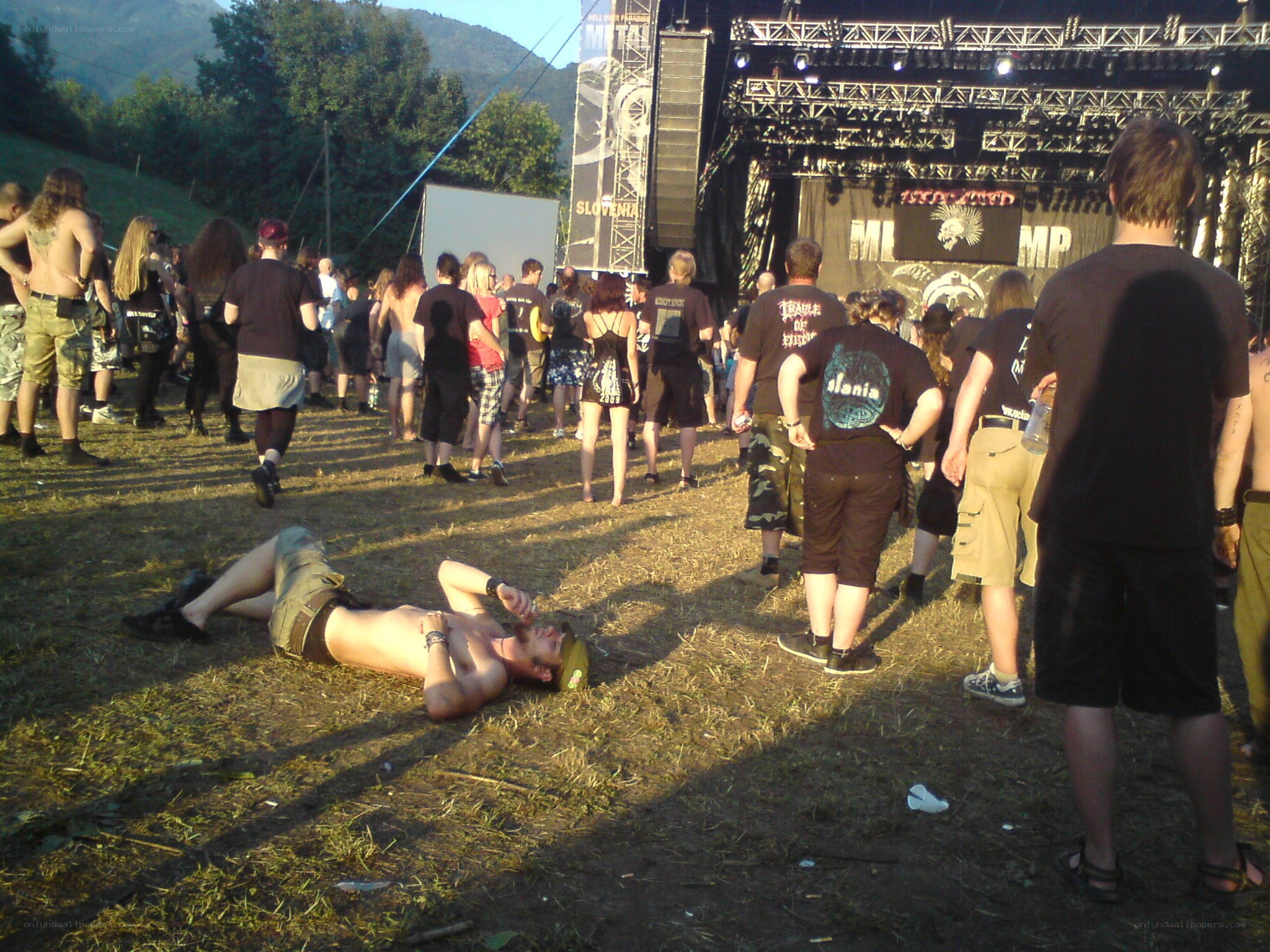 Festival crowd with man on ground