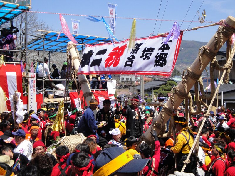 Festival with bamboo poles and banner