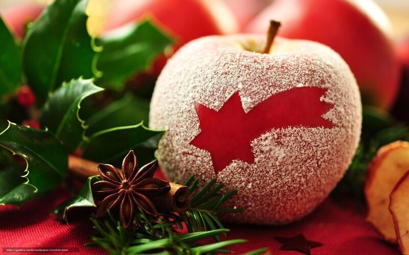 Festive apple with holly and spices