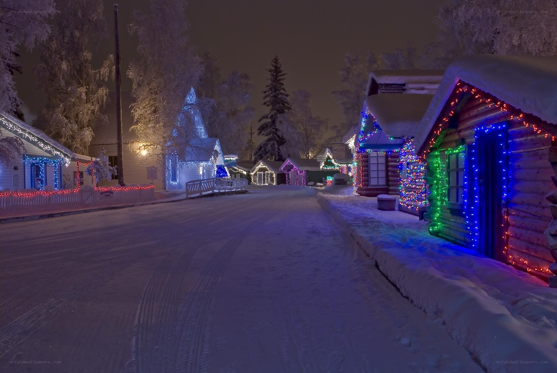 Festive winter village at night