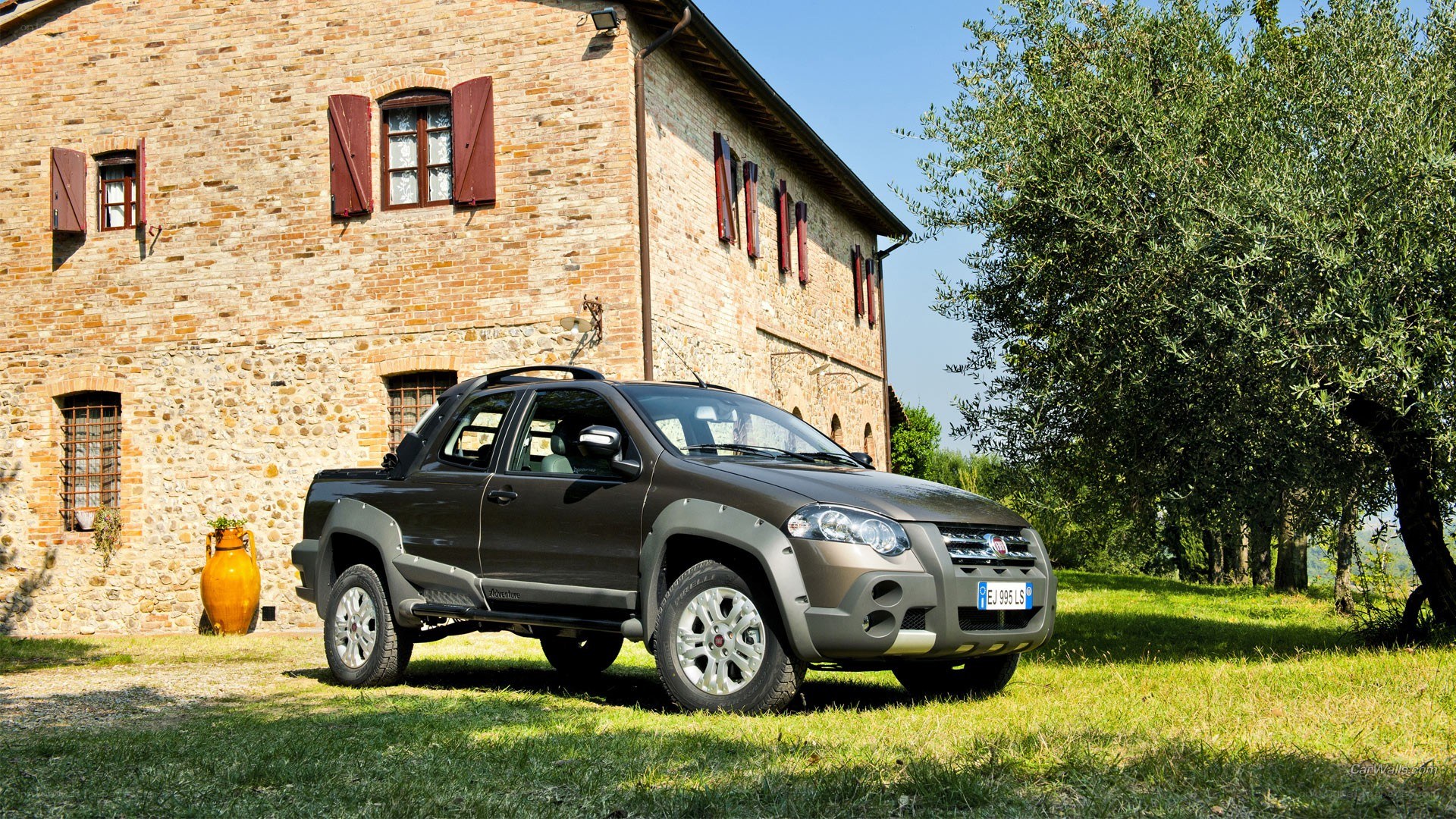 Fiat Strada pickup in rural setting