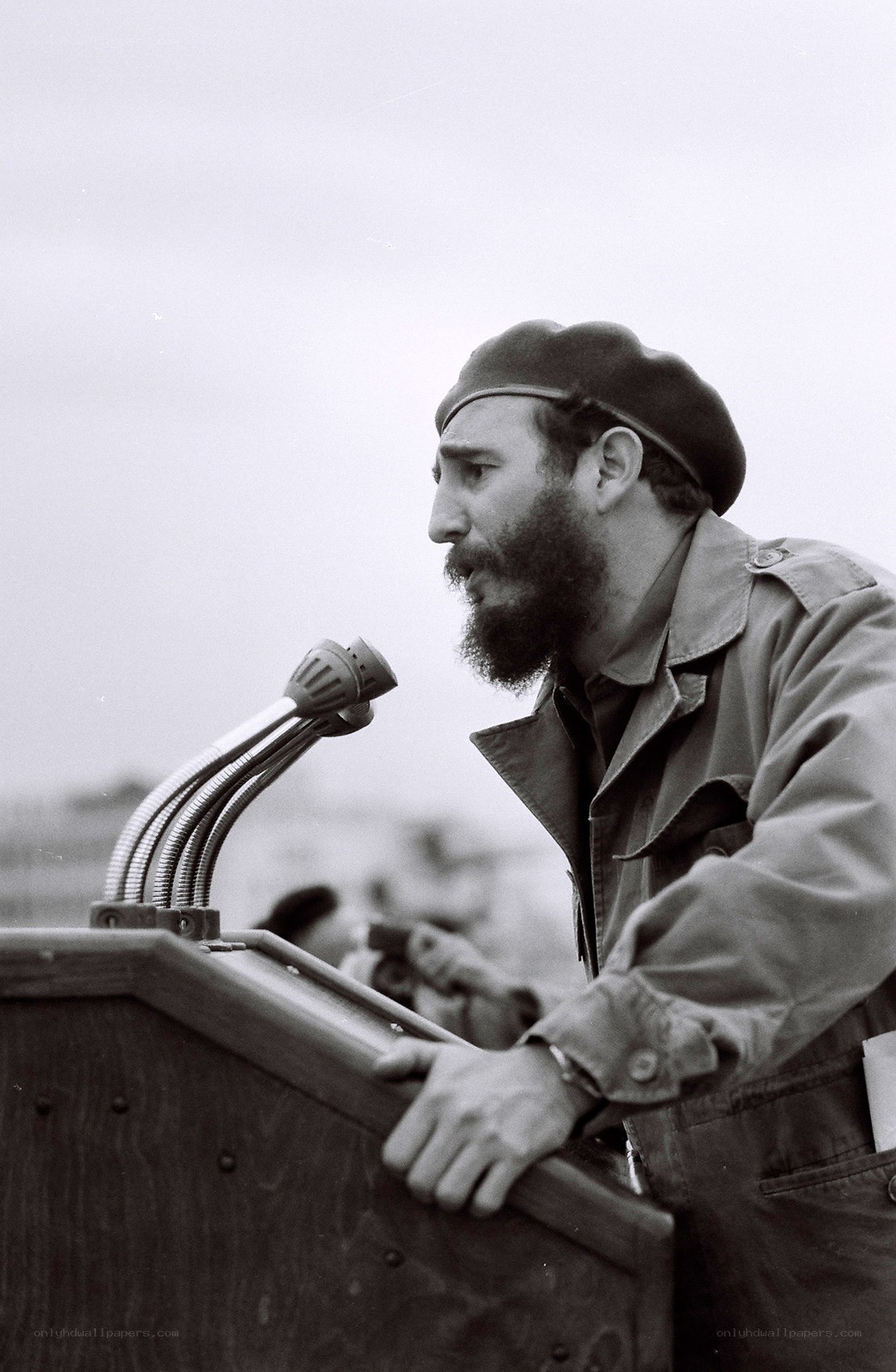 Fidel Castro speaking at podium