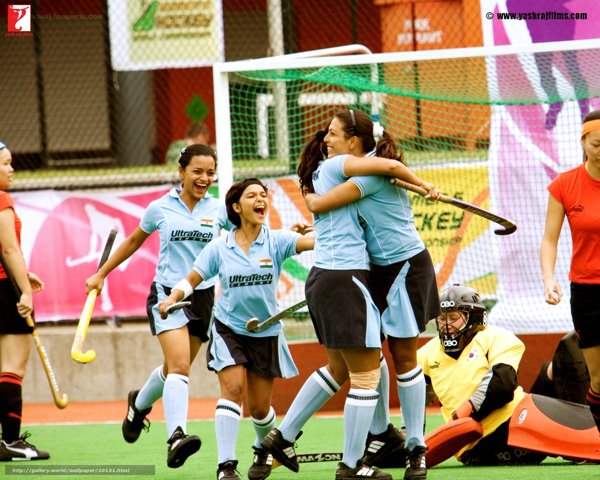 Field hockey players celebrating