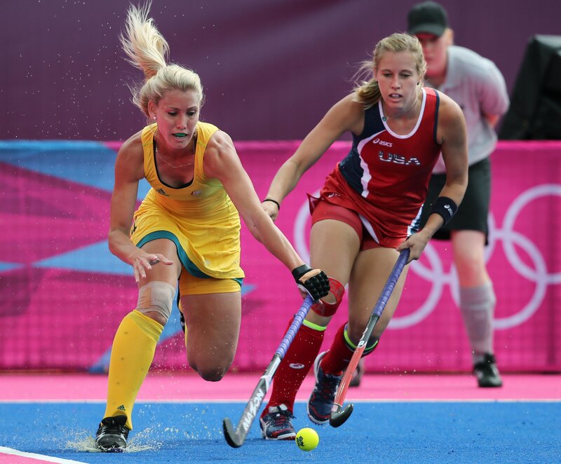 Field hockey players in action