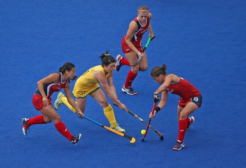 Field hockey players in action