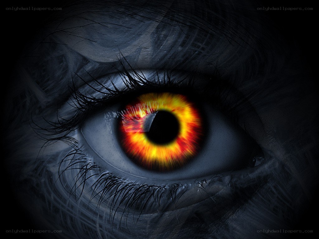 Fiery eye in dark surroundings