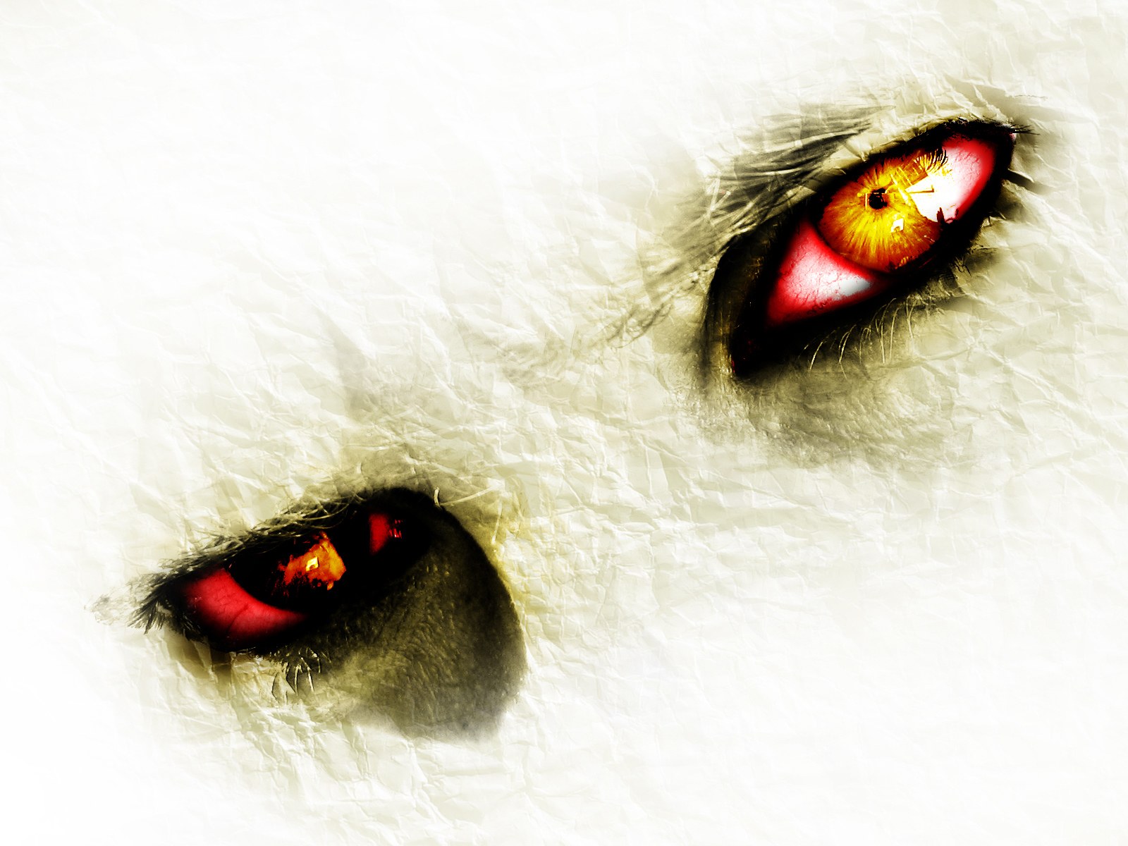 Fiery eyes in crumpled paper