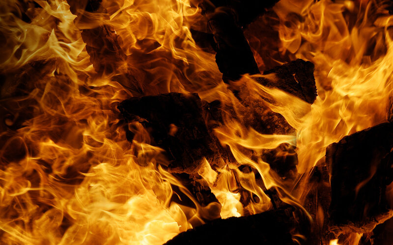 Fiery flames burning wood