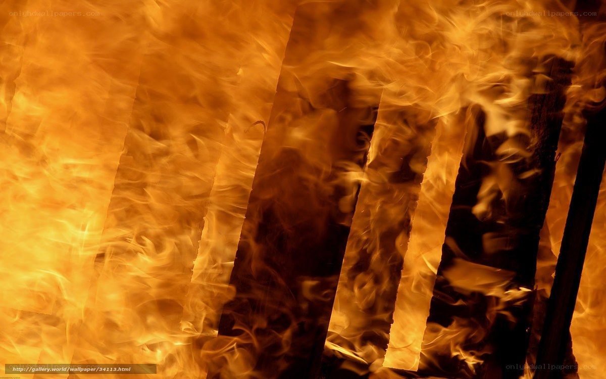 Fiery flames engulf wooden beams