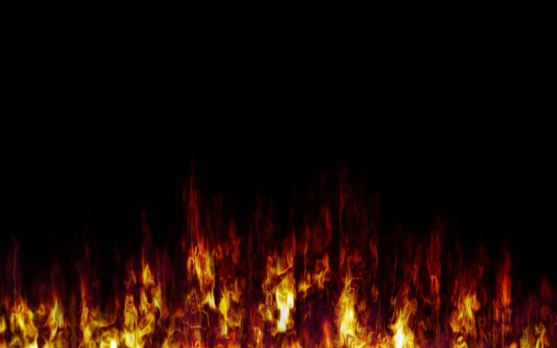 Fiery flames on black background