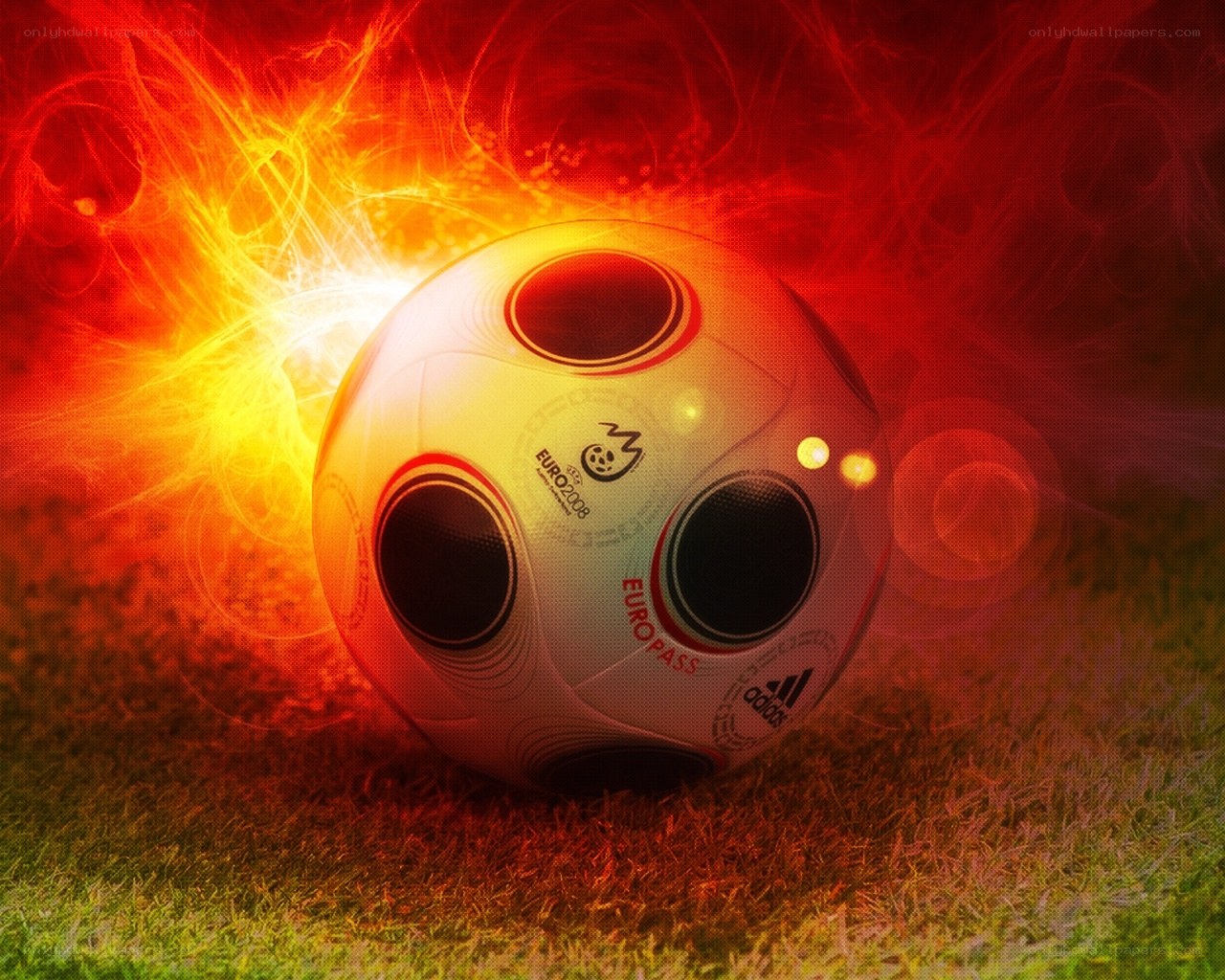 fiery soccer ball on grass