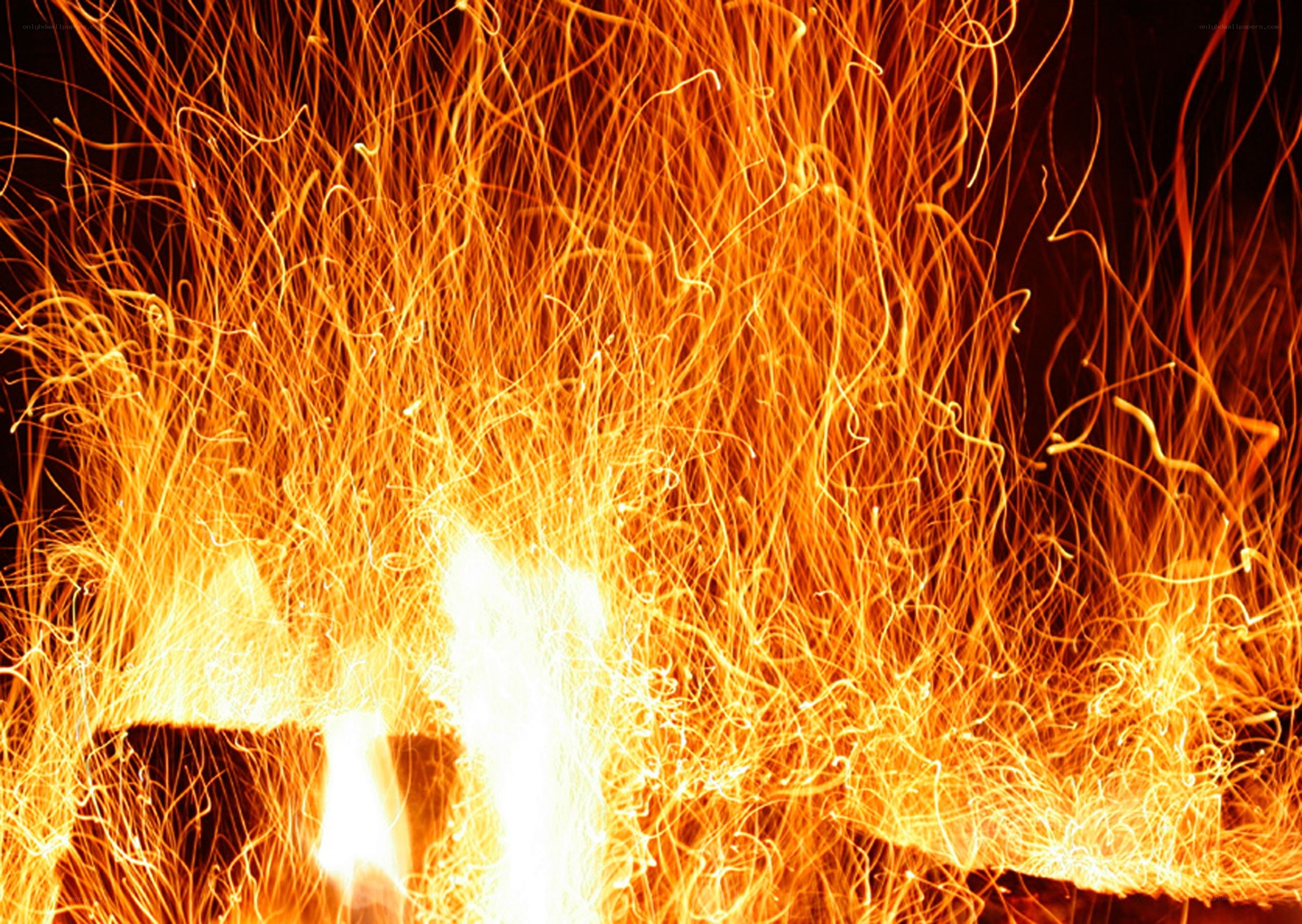 Fiery sparks rising from a fire