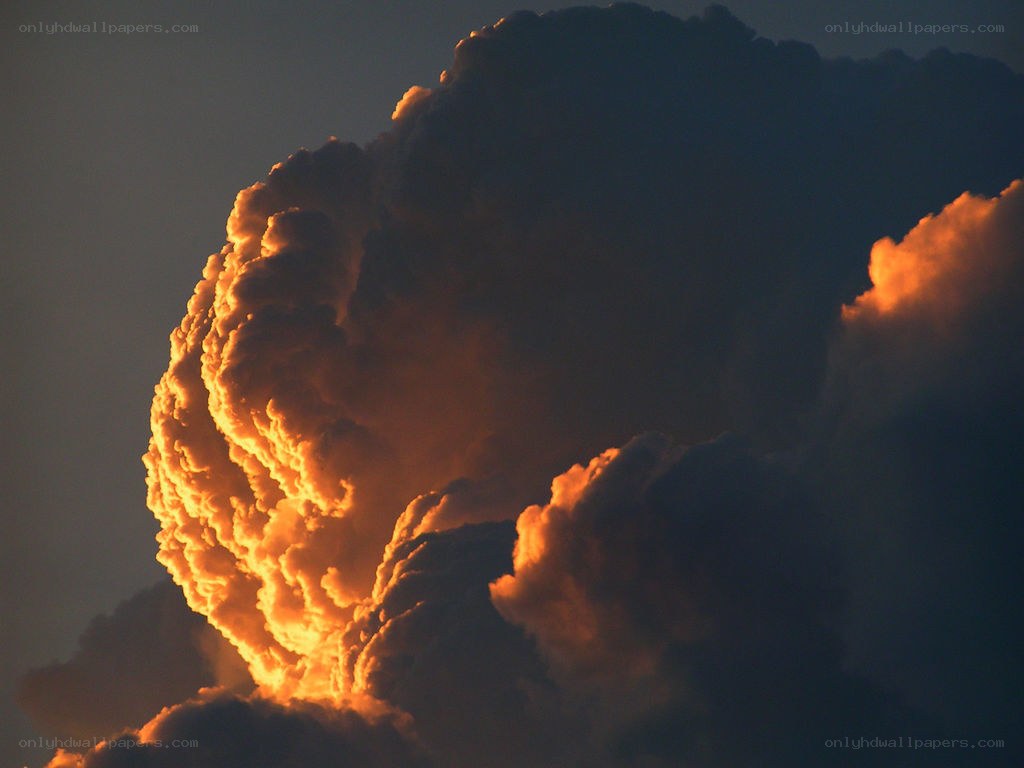Fiery storm cloud at dusk