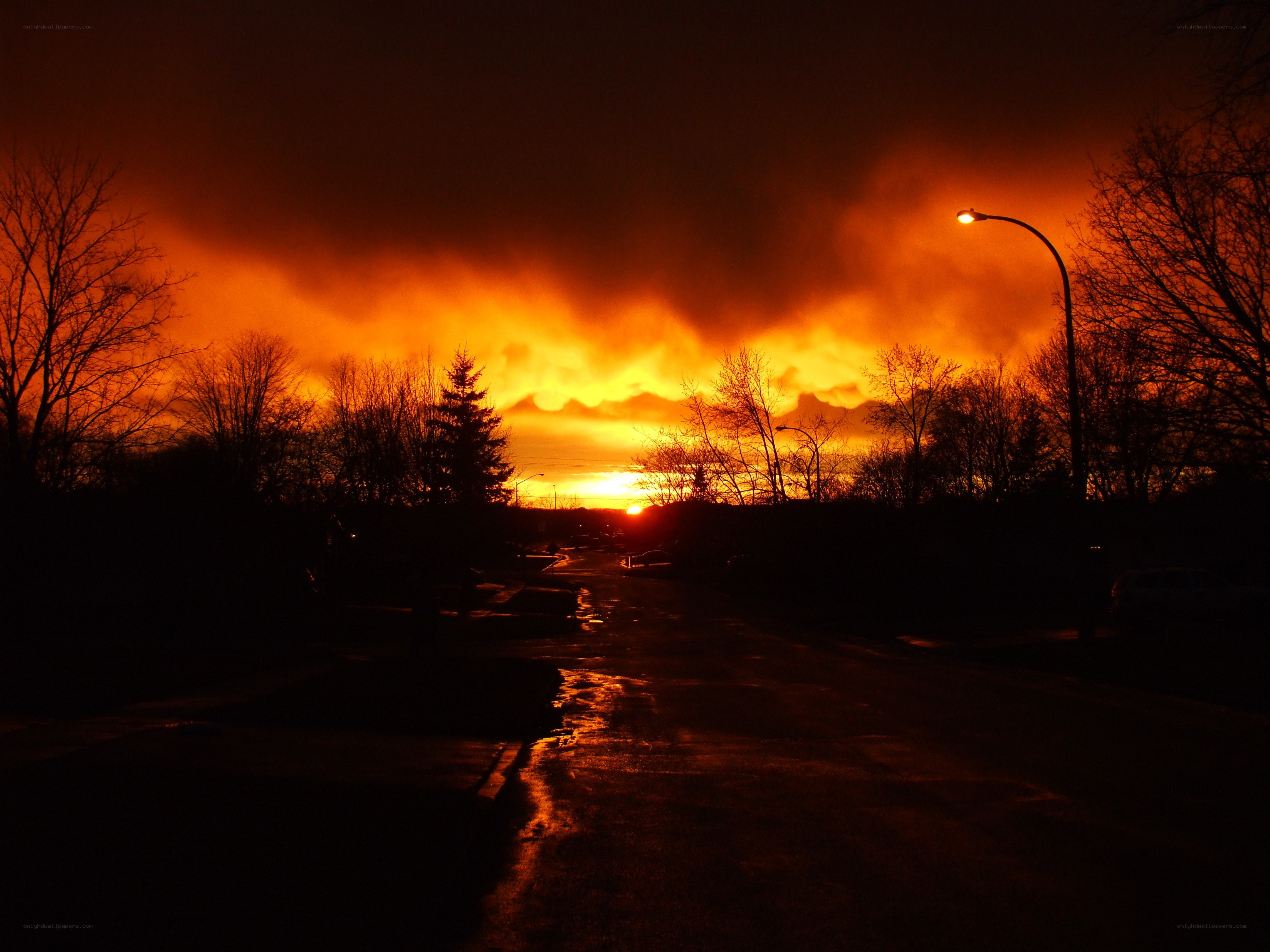 Fiery sunset over a quiet street