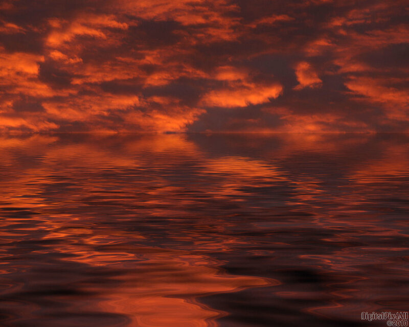 Fiery sunset over water