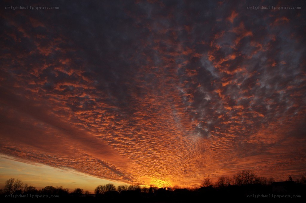 Fiery sunset with textured clouds