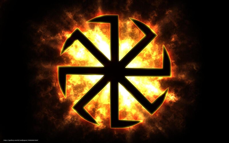 fiery symbol on dark background