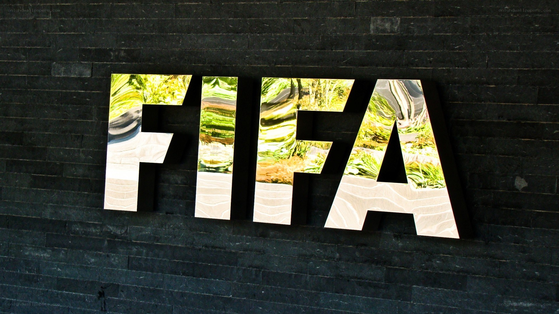 FIFA logo on dark wall