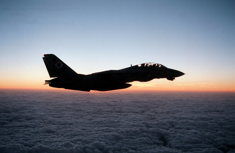 Fighter Jet Above Clouds — Blue, Dramatic