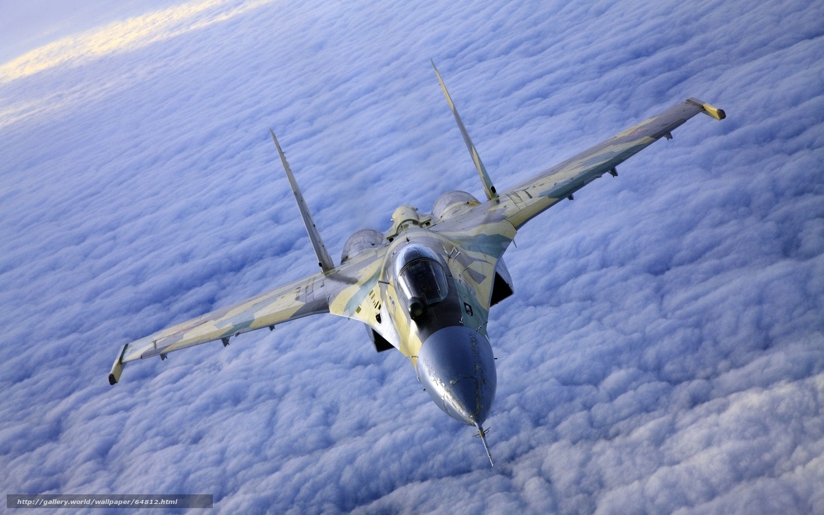 fighter jet above clouds