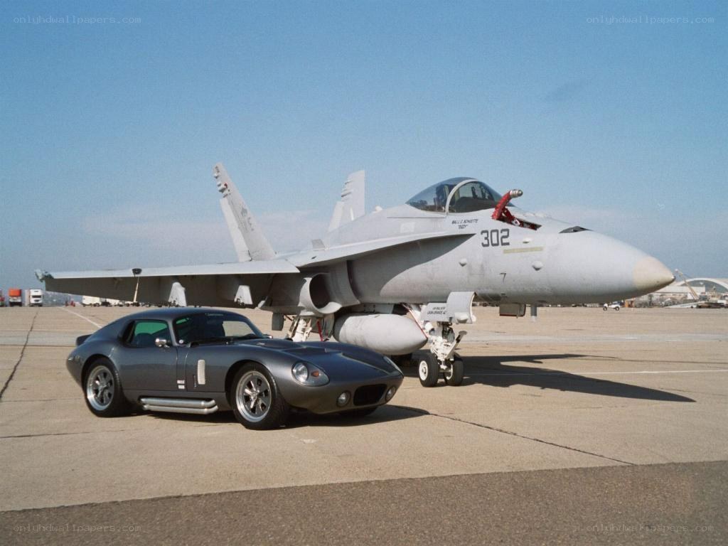 Fighter jet and classic car