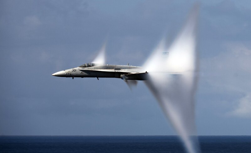 Fighter Jet Breaking Sound Barrier — Blue, Dramatic, Afternoon