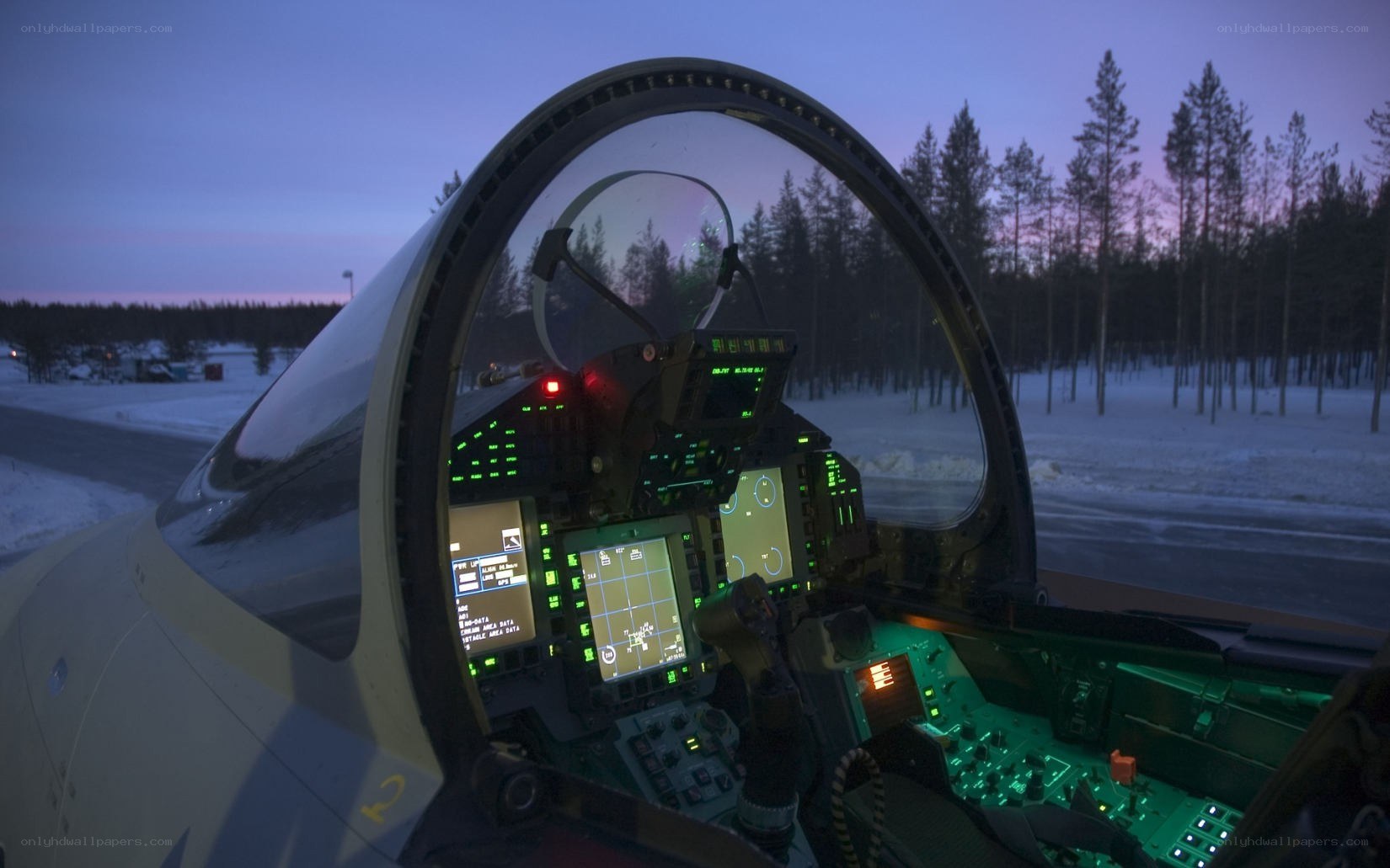 Fighter jet cockpit at dusk