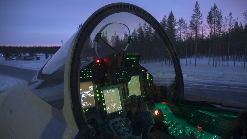 Fighter jet cockpit at dusk